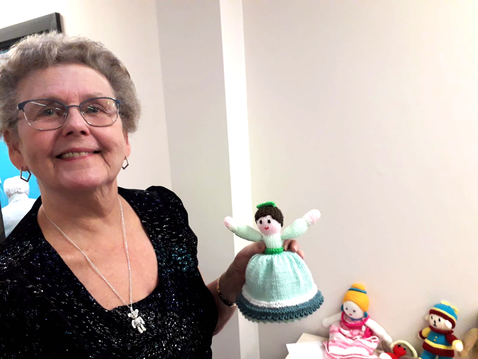 Our volunteer and trustee, Jean, with Craft Club dolls