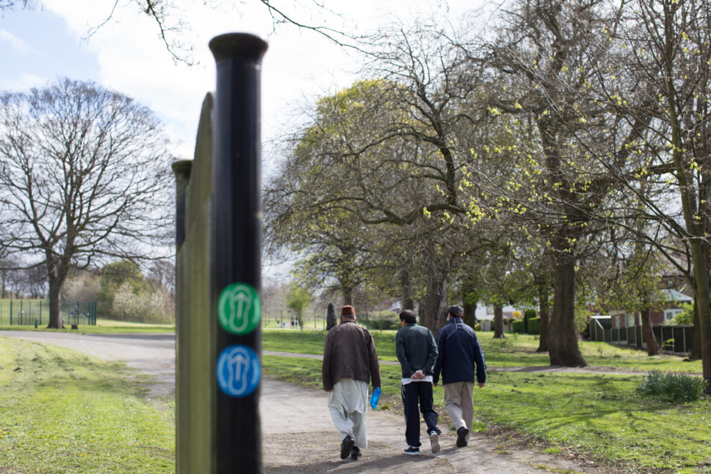 Photo of men walking in High Hazels Park