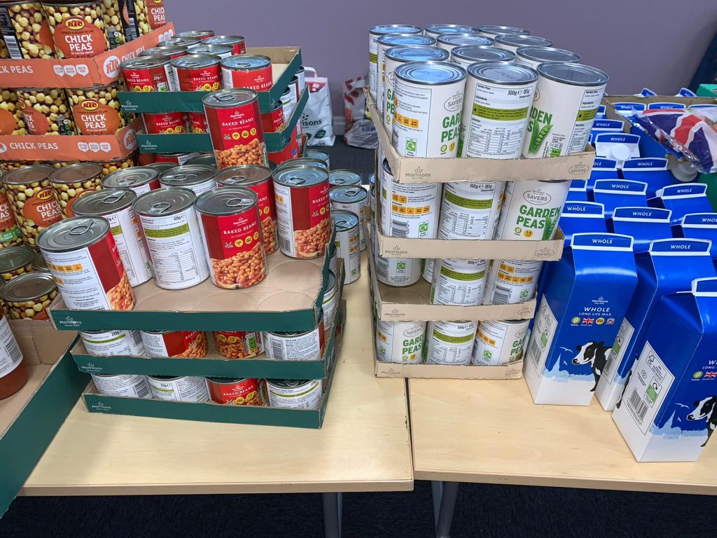 photo of tins and cartons of food