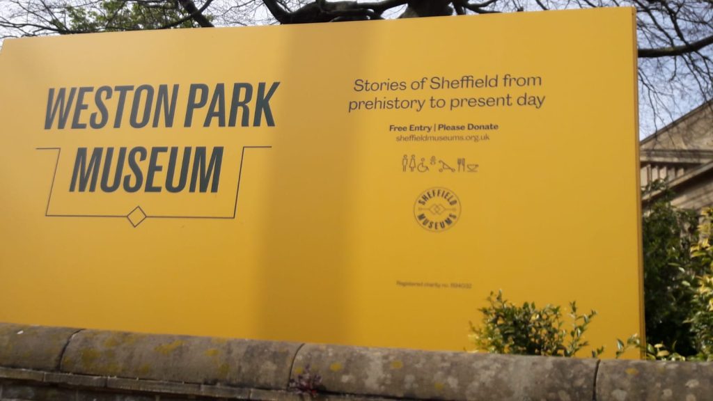 Yellow sign for Weston Park Museum