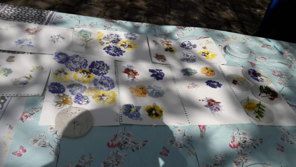 floral artwork on a table in the sunshine