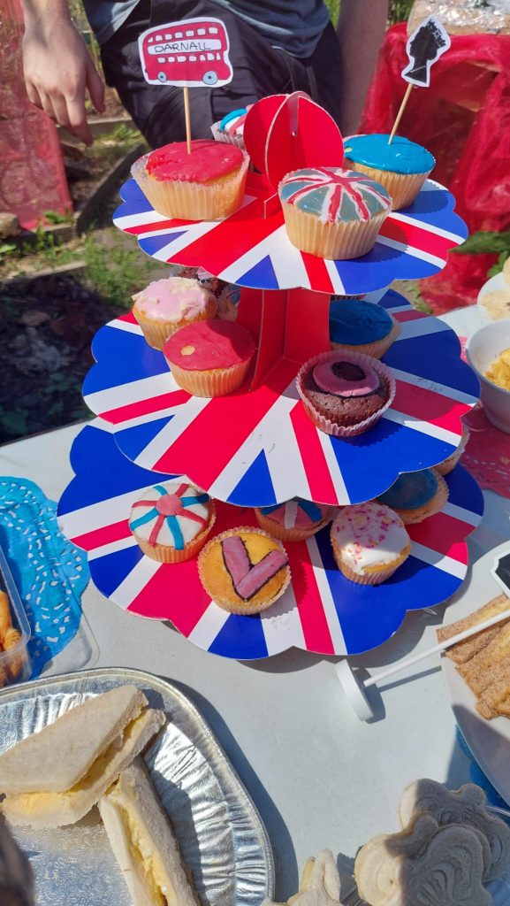 decorated buns on a Union Jack tiered cake stand