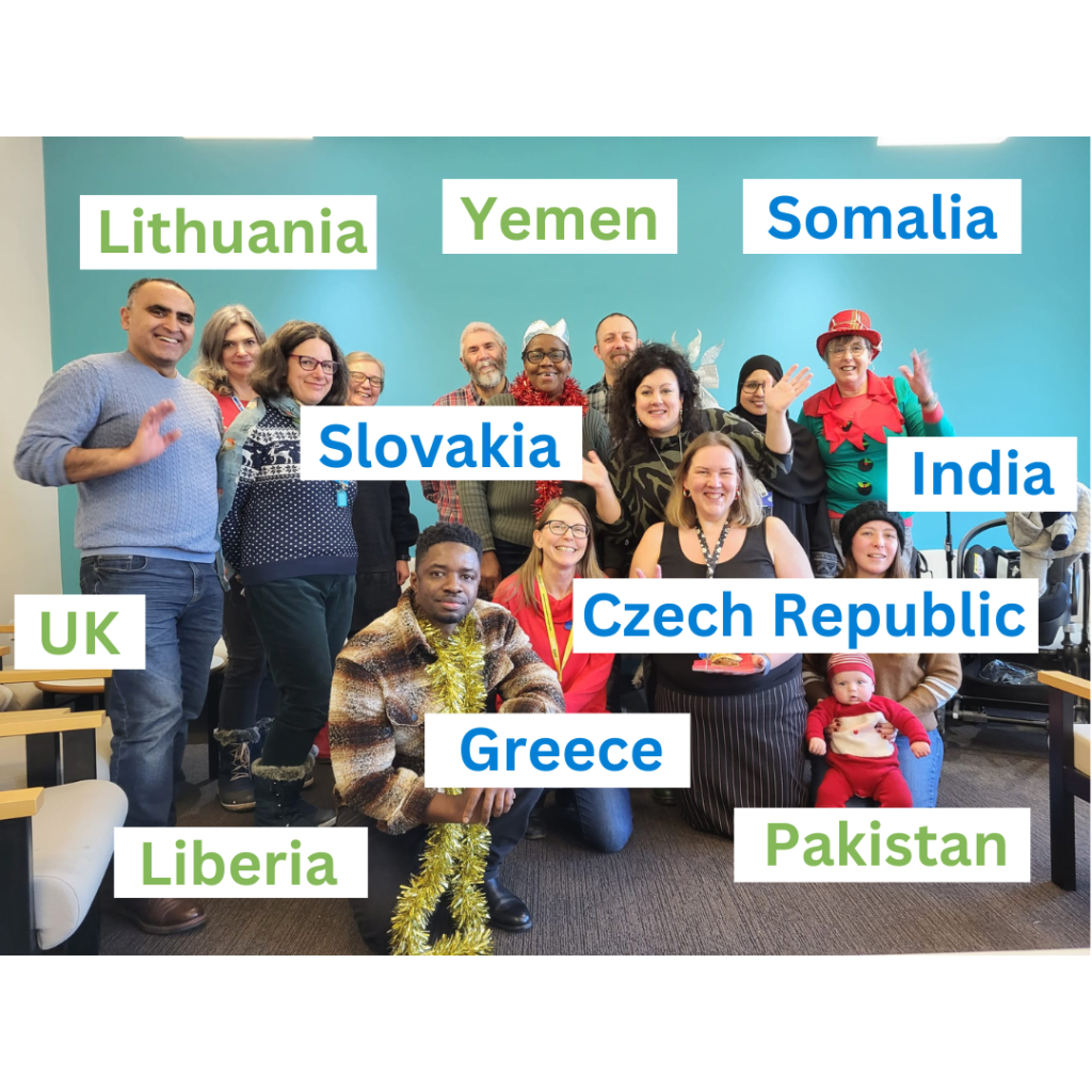 group of people smiling and waving to camera, with countries of origin in labels on the photo.