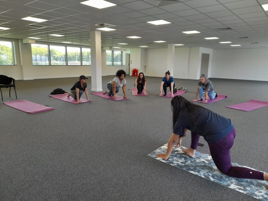 women doing yoga