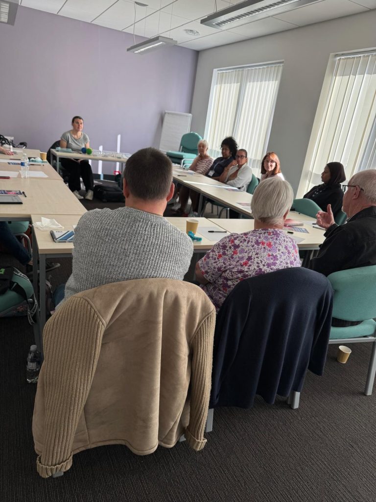 People around a table in a meeting room