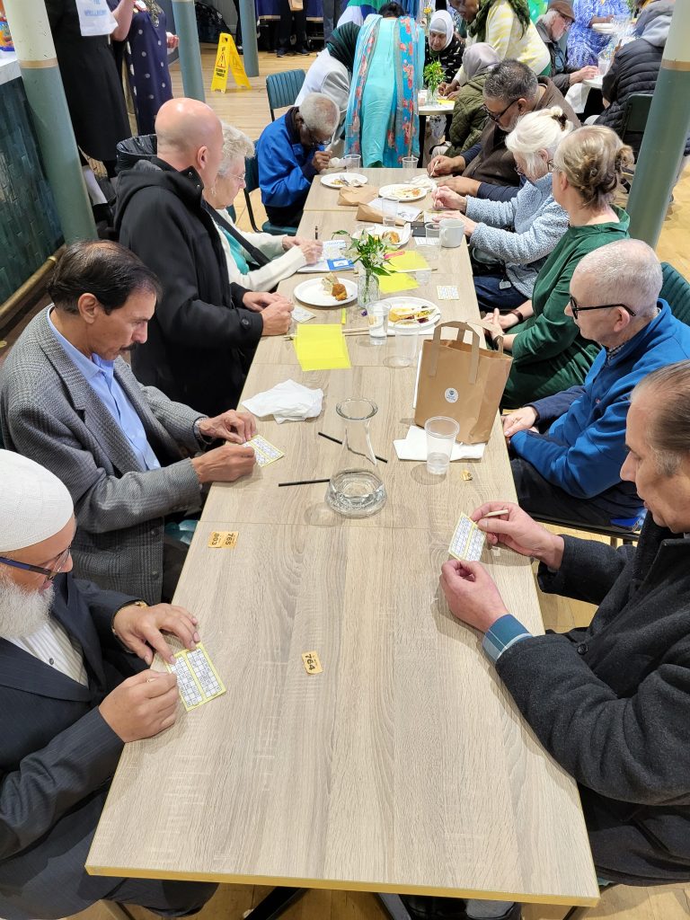 Men playing bingo at an event